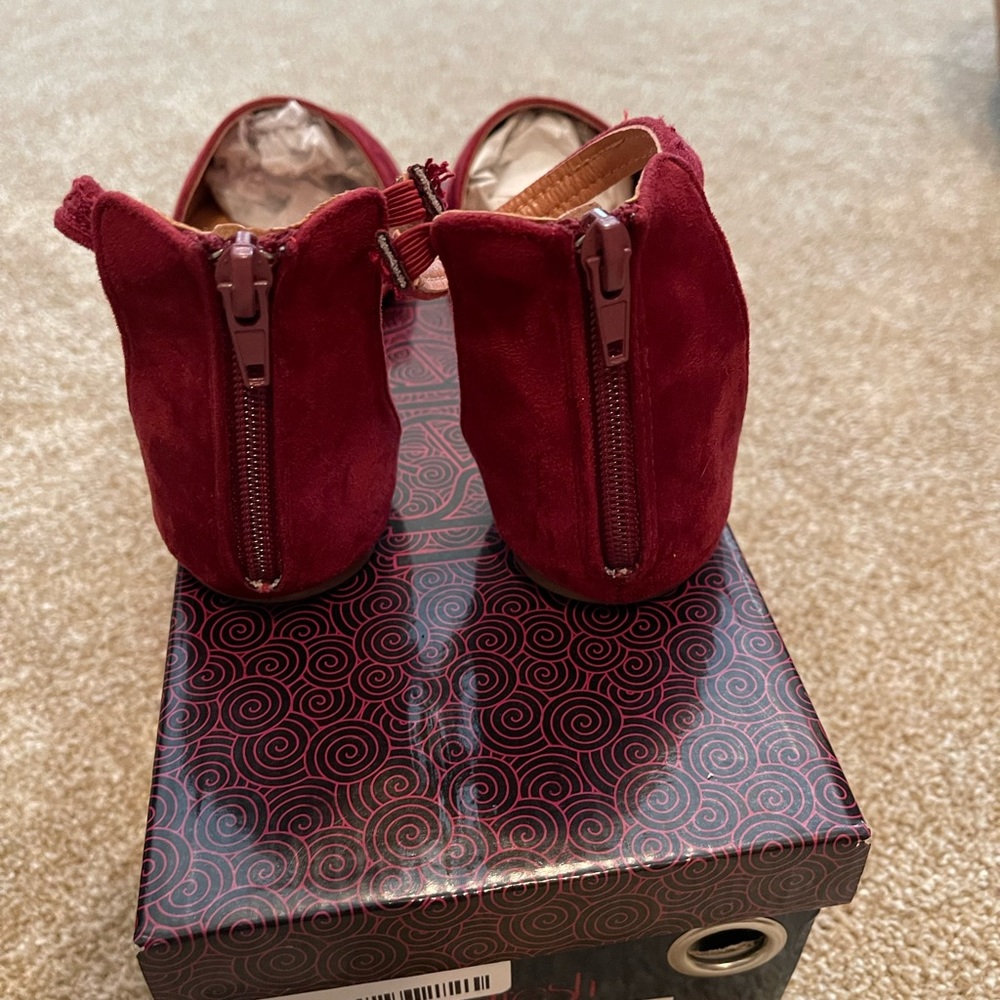 Red zip up flats